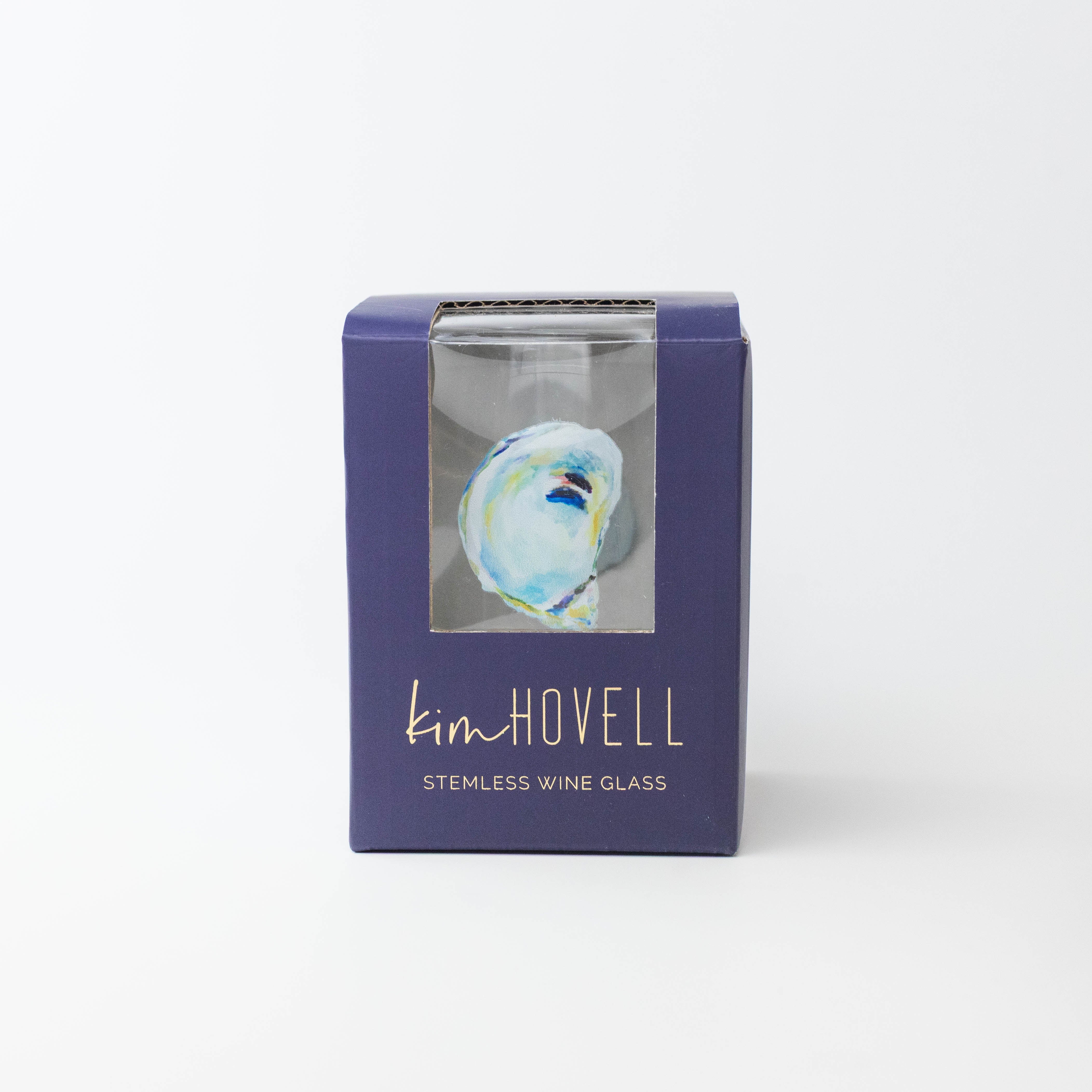 Kim Howell stemless wine glass in a navy blue box on a white background