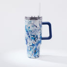 Kim Hovell 40 ounce tumbler with straw and lid featuring blue shell pattern artwork 'Azul Oysters' on a white background 