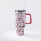 Kim Hovell 40oz tumbler with lid and straw featuring Peach Gems pink shell pattern