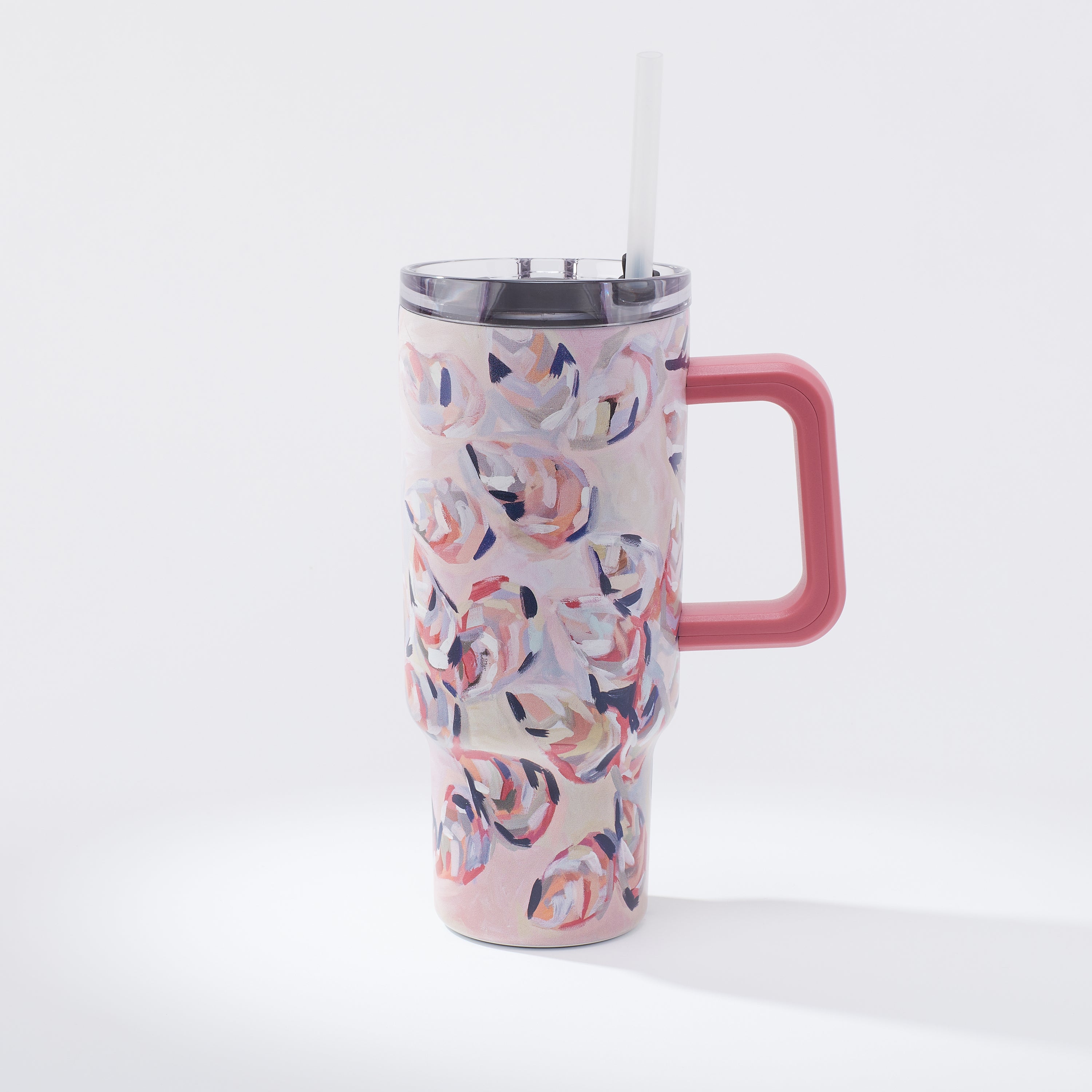 Kim Hovell 40oz tumbler with lid and straw featuring Peach Gems pink shell pattern