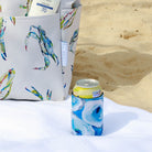 yellow soda can with a can cover featuring a blue and white oyster pattern by Kim Hovell