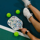 Oyster Pattern Pickleball Paddle on Pickleball Court 