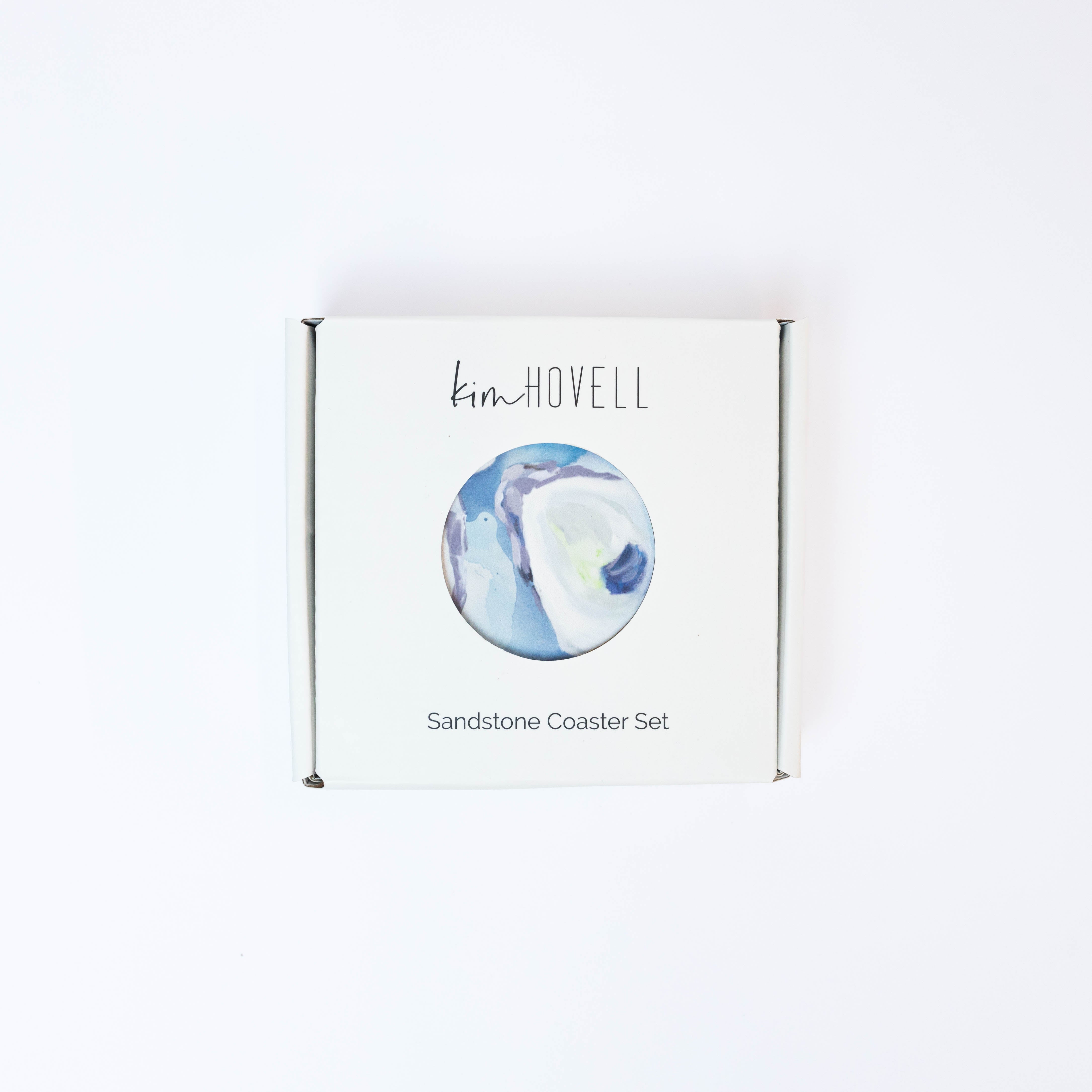 Kim Hovell Ebb and Flow blue and white oyster pattern sandstone coaster in white box packaging 