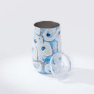Kim Hovell blue and white oyster patterned wine tumbler with a removable lid, against a white background.