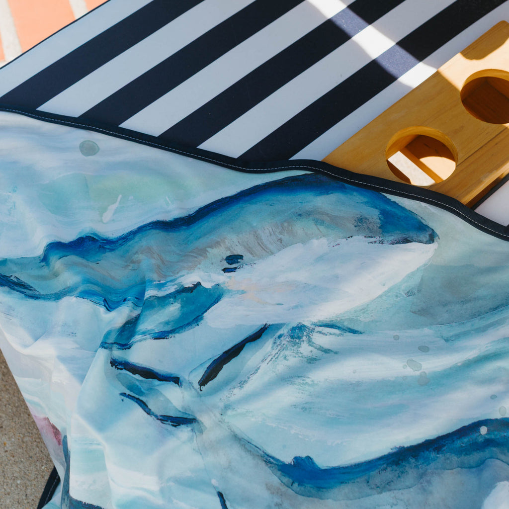 Kim Hovell Deep Sea whale blanket outside on a children's outdoor chair