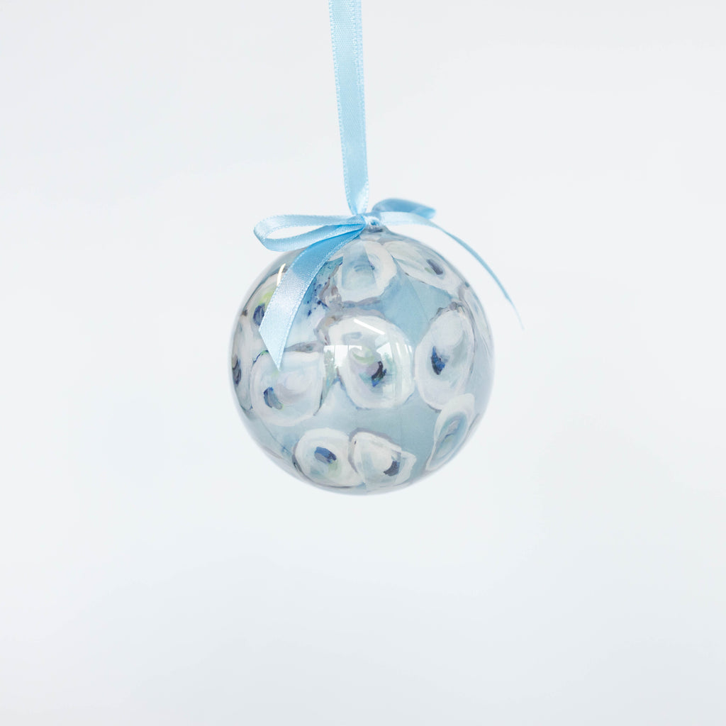 Kim Hovell decoupaged ebb and flow oyster design hanging ornament with blue ribbon